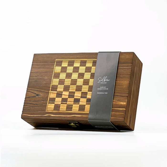 Wooden chess set packaging with a checkered design on a white background - Image