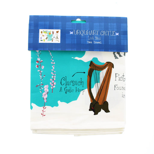 Packaged tea towel with harp design and text on a white background - Image