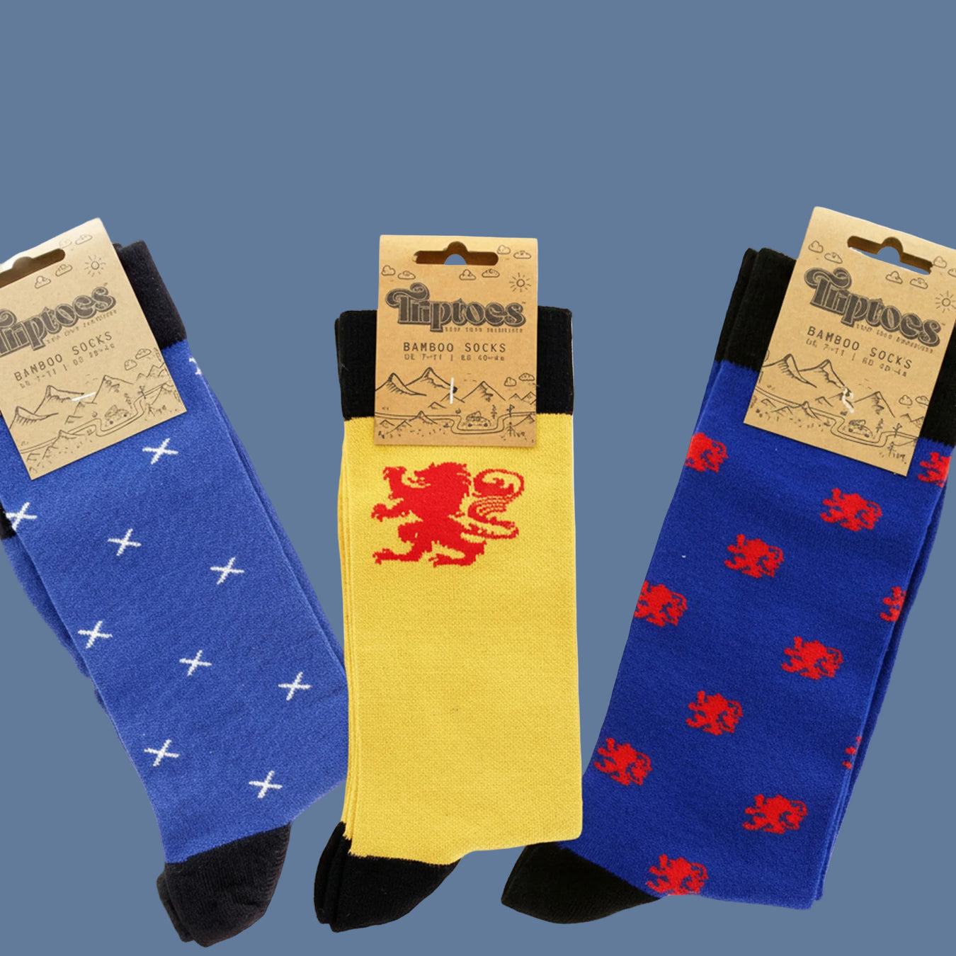 Three pairs of Scotland socks with different patterns on packaging labeled 'Tiptoes'. - Image