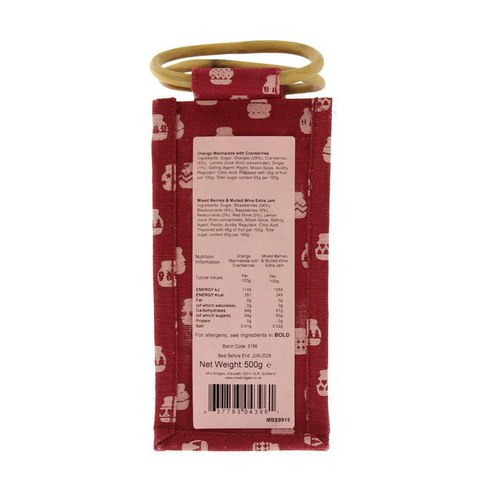 The back of a red fabric pouch with a white nutrition label and a gold-colored loop handle, shown on a plain white background. - Image