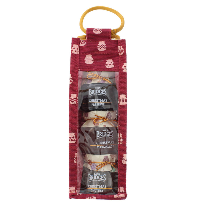 A packaged set of three Mrs Bridges Christmas Preserves presented in a burgundy fabric pouch with a yellow carrying loop. - Image