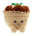 Plush toy resembling a festive mince pie with a smily face on a white background - Image