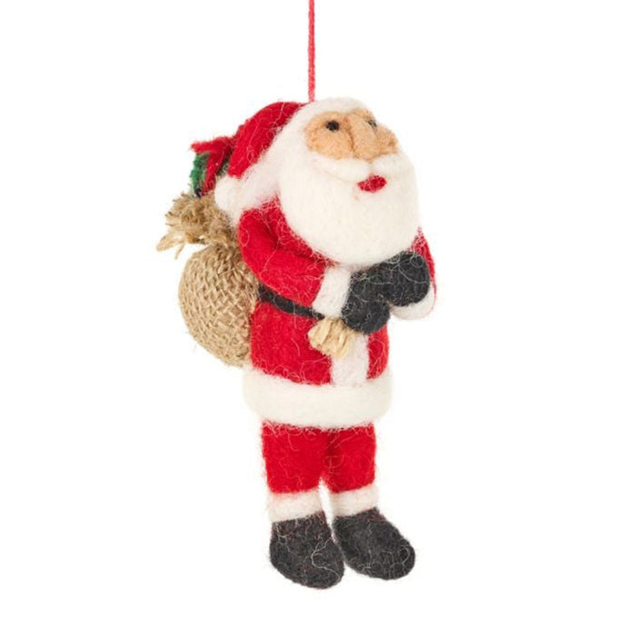 Felted Santa Claus ornament with a sack on a white background - Image