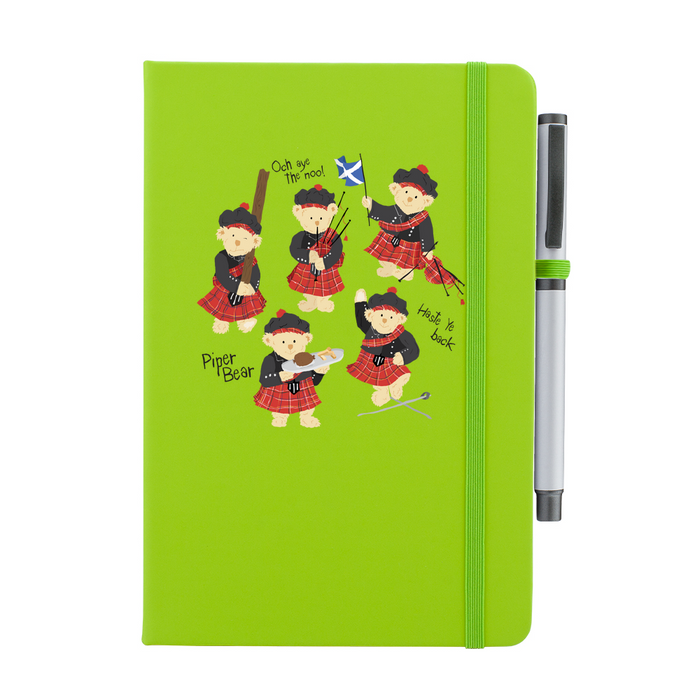 A beautiful designed lime green notebook featuring a vibrant illustration of dancing piper bears in red and black, playing bagpipes joyfully. A lime green strap closes over the right hand side with a matching pen.