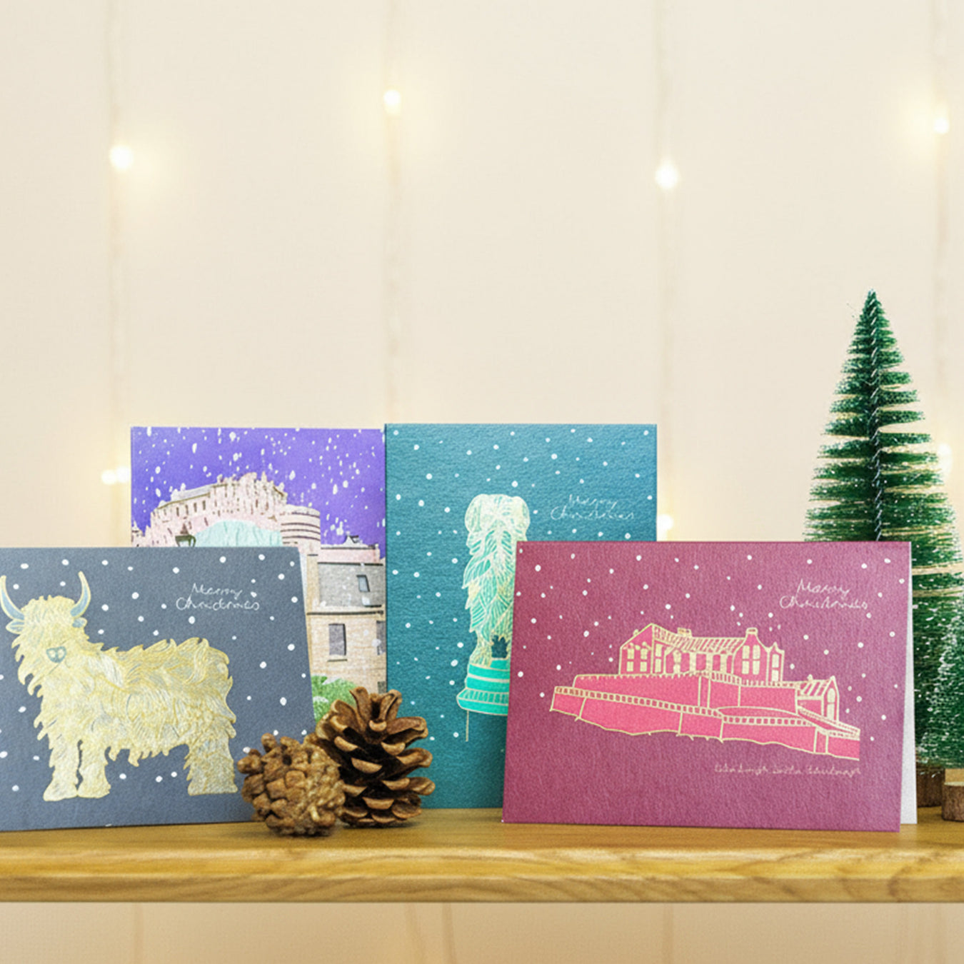 Selection of Christmas cards with festive decor and neutral backdrop - Image