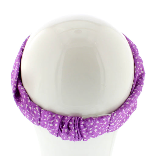 White mannequin head shows a tulip print headband in lilac and white 