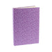 purple coloured hardback notebook with repeat tulip pattern design shown upright at an angle with pages slightly shown at top