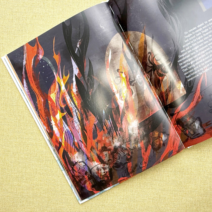 Open book with a colorful illustration of a face with flames on a yellow fabric background - Image