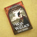 Book cover of 'To War with Wallace' on a textured yellow background - Image