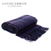 forever modern tartan wool throw shown folded with lochcarron logo in top left corner of image