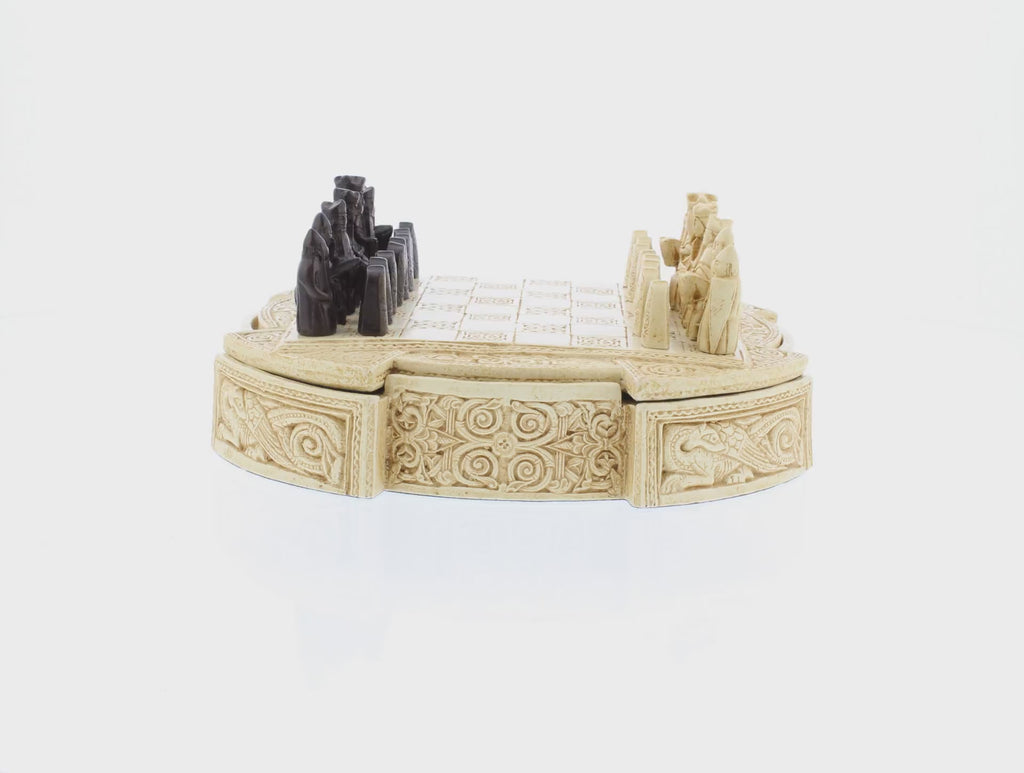 360 rotating view of ornate isle of lewis chess set with ivory cream base