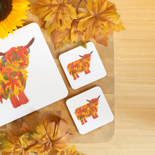 set of 2 autumn style illustrative drinks coasters with image of highland cow