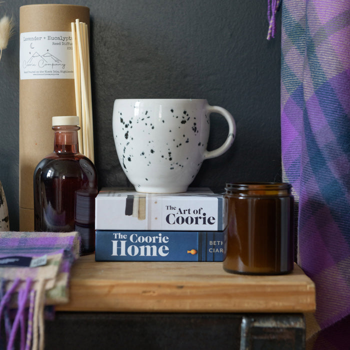 Candle In Amber Jar Lavender & Eucalyptus shown with other items from the coorie collection