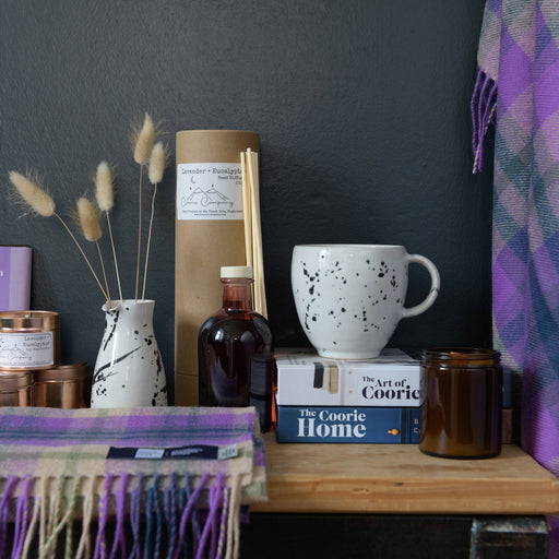 Reed Diffuser Lavender & Eucalyptus shown with other items from the coorie collection including candle jar, throw and speckle collection