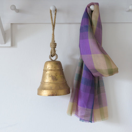 coorie tartan fine wool scarf shown hanging on wall