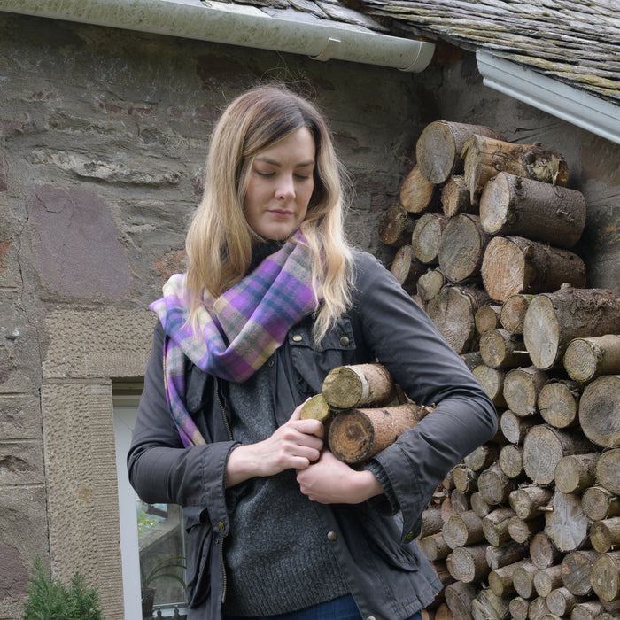 coorie tartan scarf wrapped on model in scottish countryside