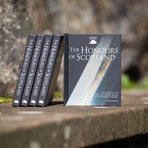 the honours of scotland hardback book sitting on wall with other books