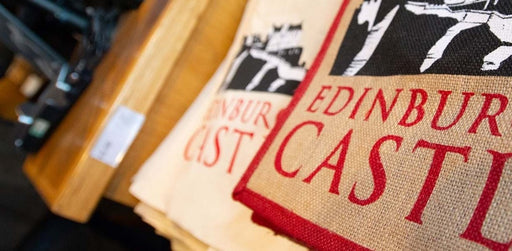 Edinburgh castle jute tote bag shown in shop