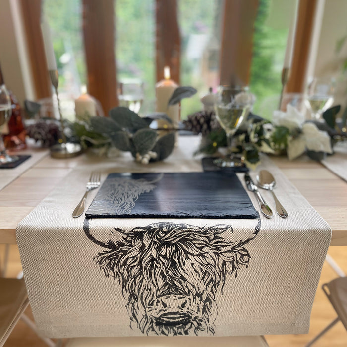 highland cow dining table linen runner shown draped over end of table