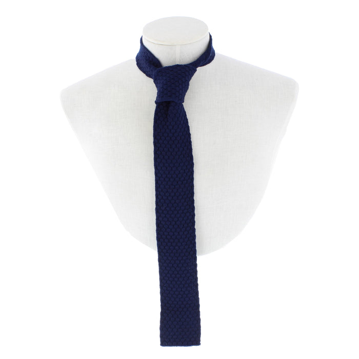 Honeycombe Tie Navy shown tied on mannequin neck