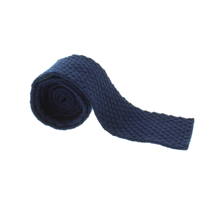 Honeycombe Tie Navy shown rolled with flat end