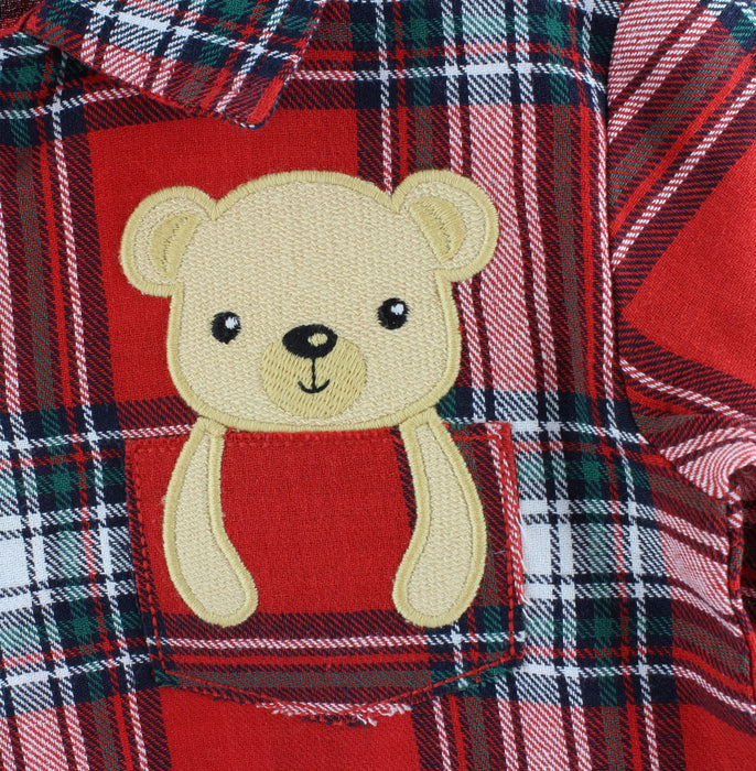 detail of pocket showing embroidered teddy bear
