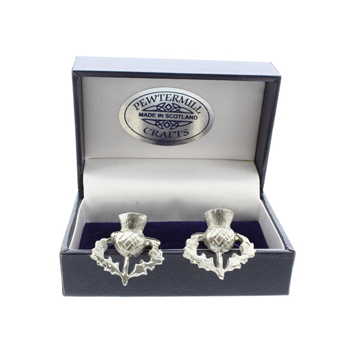 pewter thistle cufflinks shown on the side of presentation box with box open