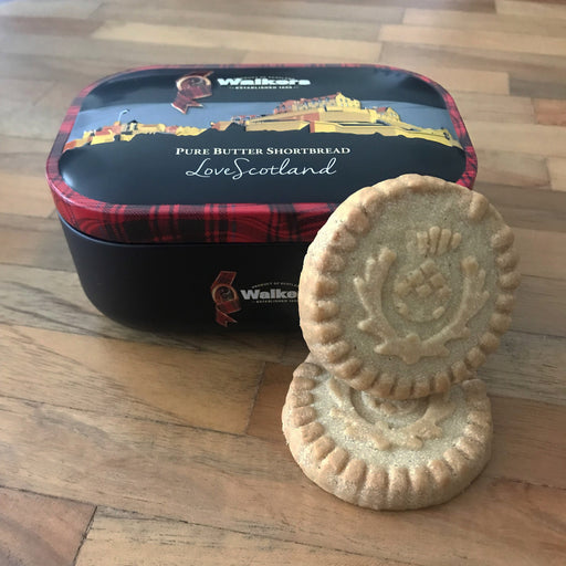 mini sized edinburgh castle walkers shortbread tin with shortbread rounds shown by tin for scale