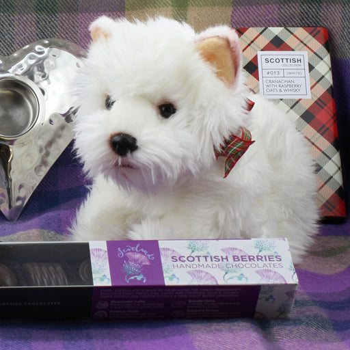 west highland terrier soft toy shown with coorie tartan and other gifts from historic scotland